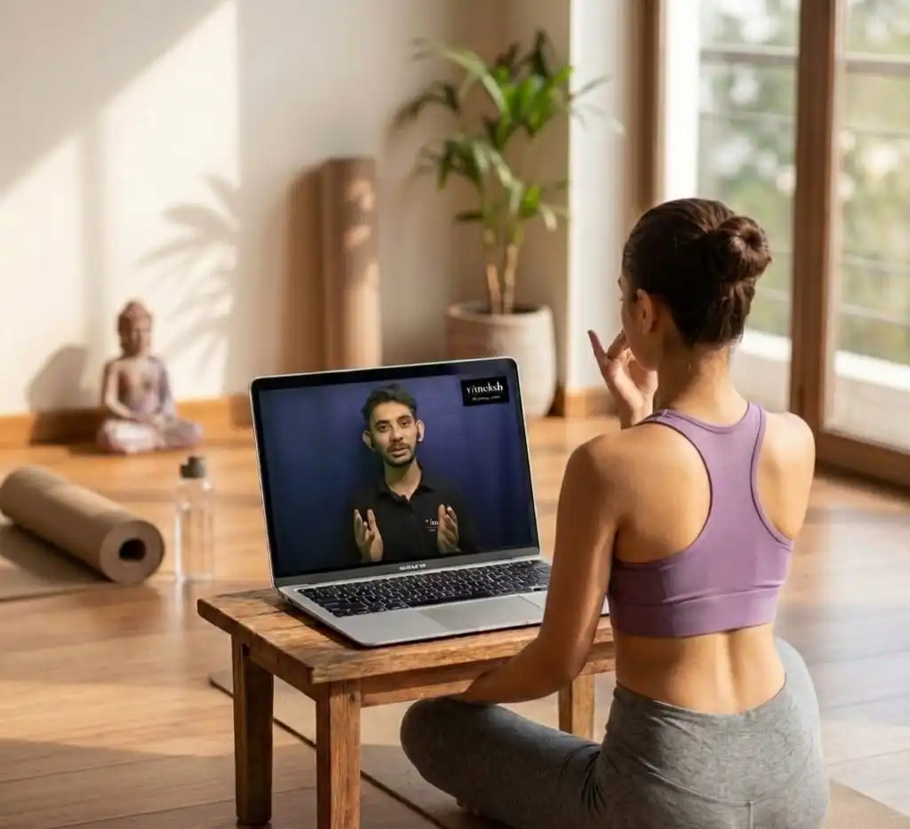 Mother and daughter practicing yoga together